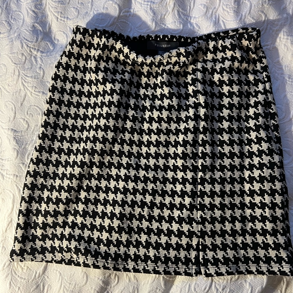 Preppy black and white checker skirt

New never worn